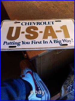 Rare Chevrolet Vtg License Plate'Putting You First in a Big Way!' U-S-A-1